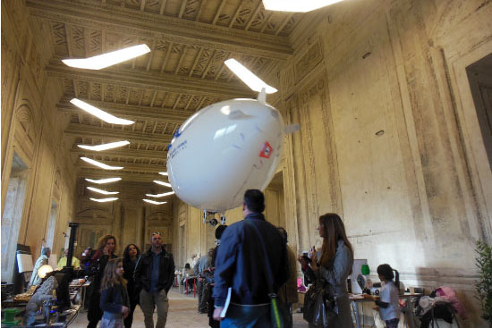 2m-rc-blimp-flying-over-people